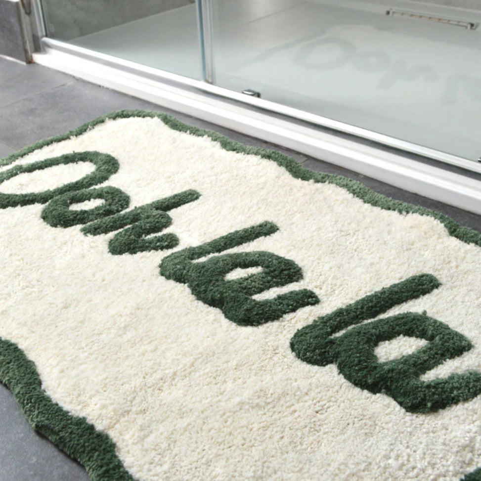 Ooh La La Slogan Scallop Bath Mat