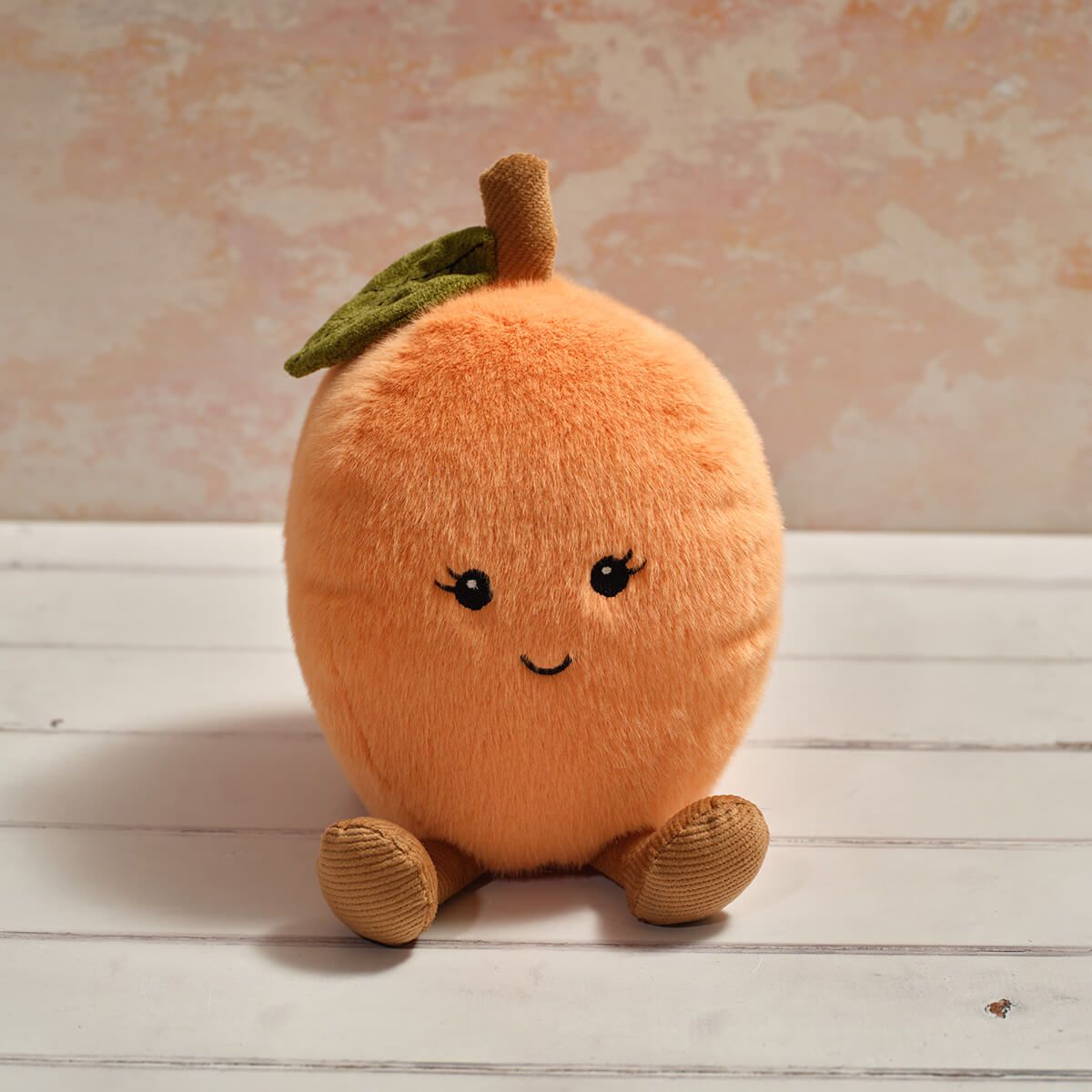 Sitting Peach Plush Toy