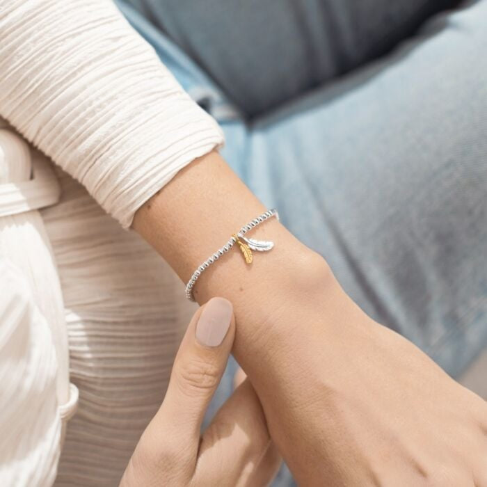 A Little 'Feathers Appear When Loved Ones Are Near' Bracelet in Silver Plating