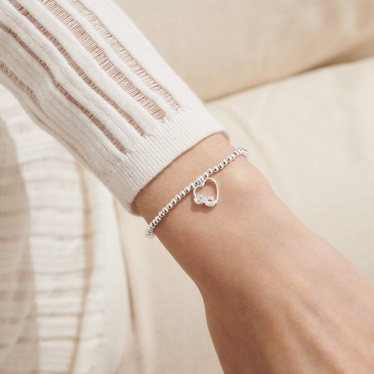 A Little 'Friends Make You Laugh Louder, Smile Brighter And Dream Bigger' Bracelet In Silver Plating